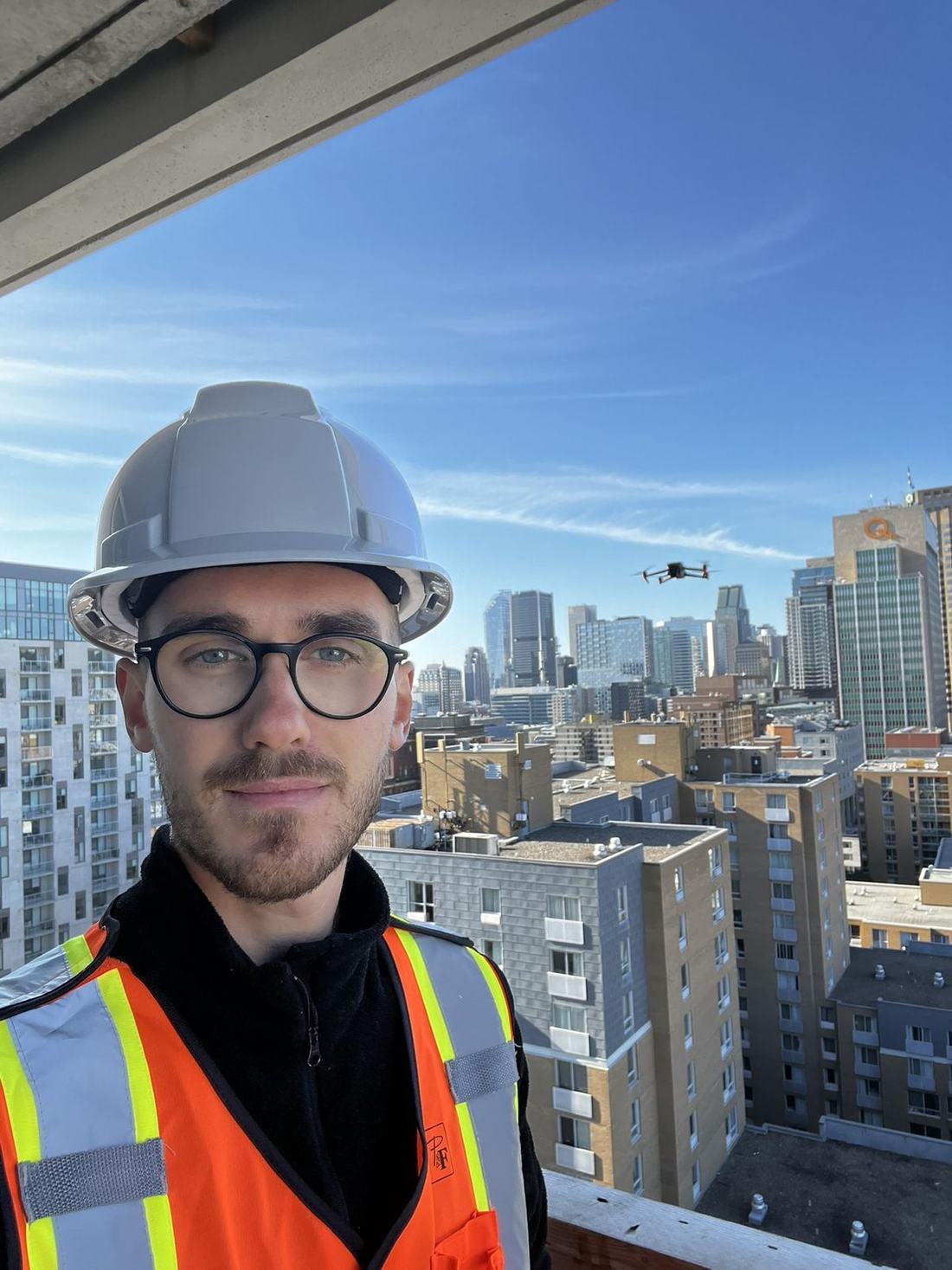 Professional drone pilot on a construction site in Montreal